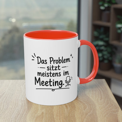 Tasse „Das Problem sitzt meistens im Meeting.“